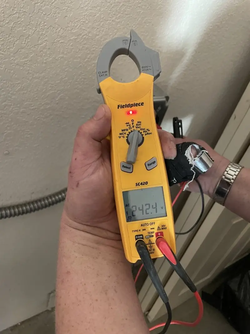 Voltage testing with clamp meter during Generator Installation in Elk